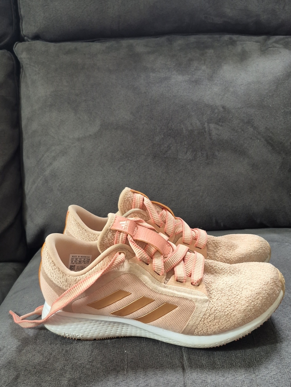 adidas Women’s Peach-Pink Knit Sneakers with Gold Stripes